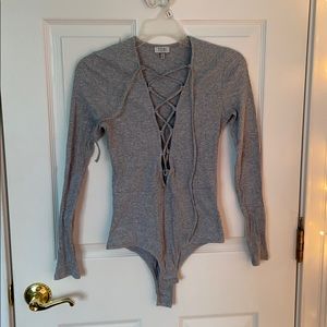 Gray lattice front tie body suit